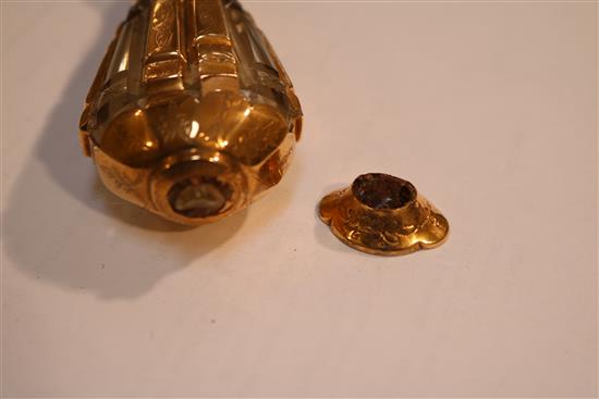 A gold mounted cut glass scent bottle, probably c.1850, 3 7/8in.